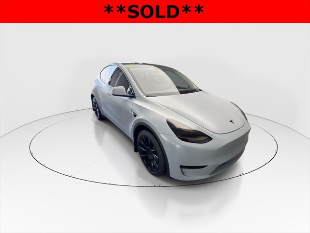 Used 2023 Tesla Model Y Long Range with VIN 7SAYGDEE2PF597774 for sale in Merriam, KS