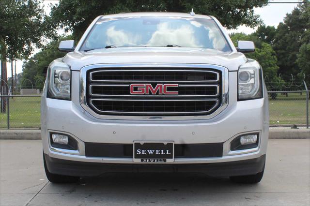 Used 2016 GMC Yukon SLT with VIN 1GKS1BKC1GR275007 for sale in Houston, TX