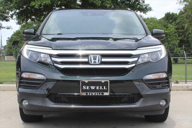 Used 2016 Honda Pilot Touring with VIN 5FNYF6H9XGB094469 for sale in Houston, TX